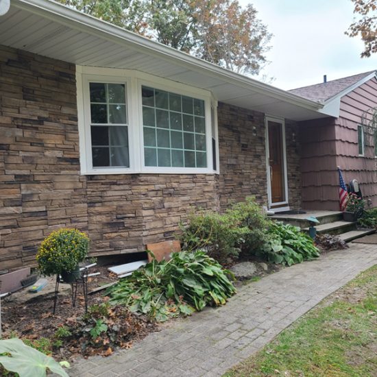 House with stone facade and garden