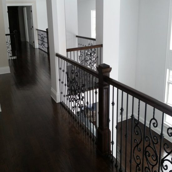 Elegant hallway with wrought iron railings